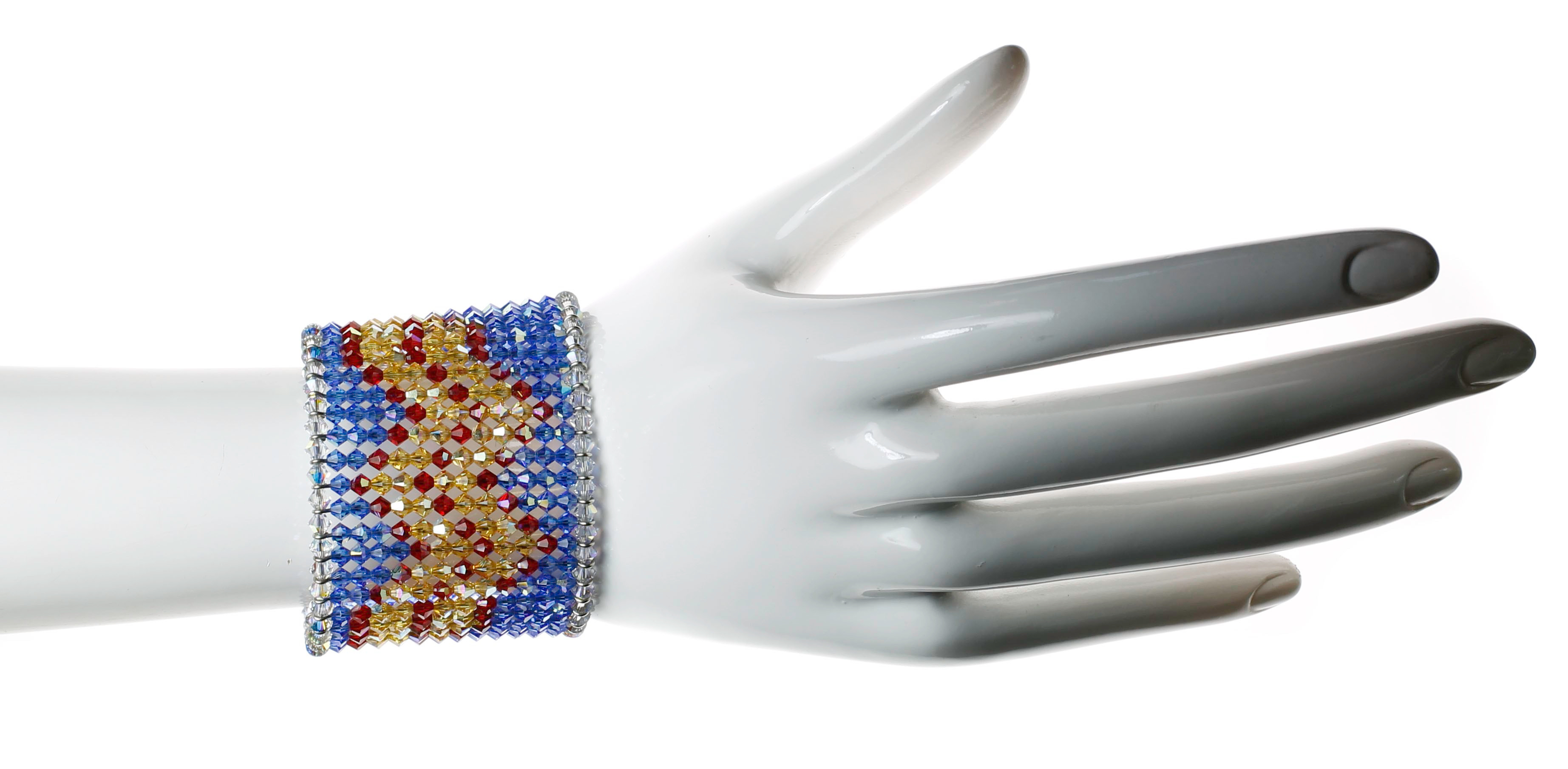 THIS WONDERFUL WONDER WOMEN INSPIRED SWAROVSKI CRYSTAL CUFF BRACELET INCLUDES APPROX. 600 SWAROVSKI CRYSTALS BY DESIGNER KAREN CURTIS